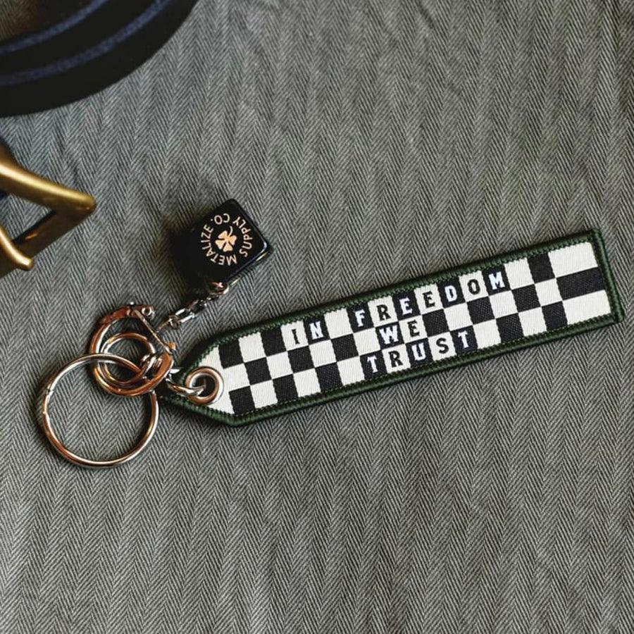 Retro motorcycle embroidered keychain accessory close-up