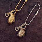 Solid brass motorcycle glove keychain detail view