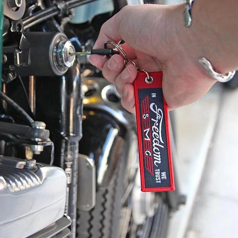 Motorcycle embroidered keychain accessory with vintage styling