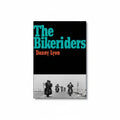 Book cover of 'The Bikeriders' by Danny Lyon with a black and white photo of bikers on a road.