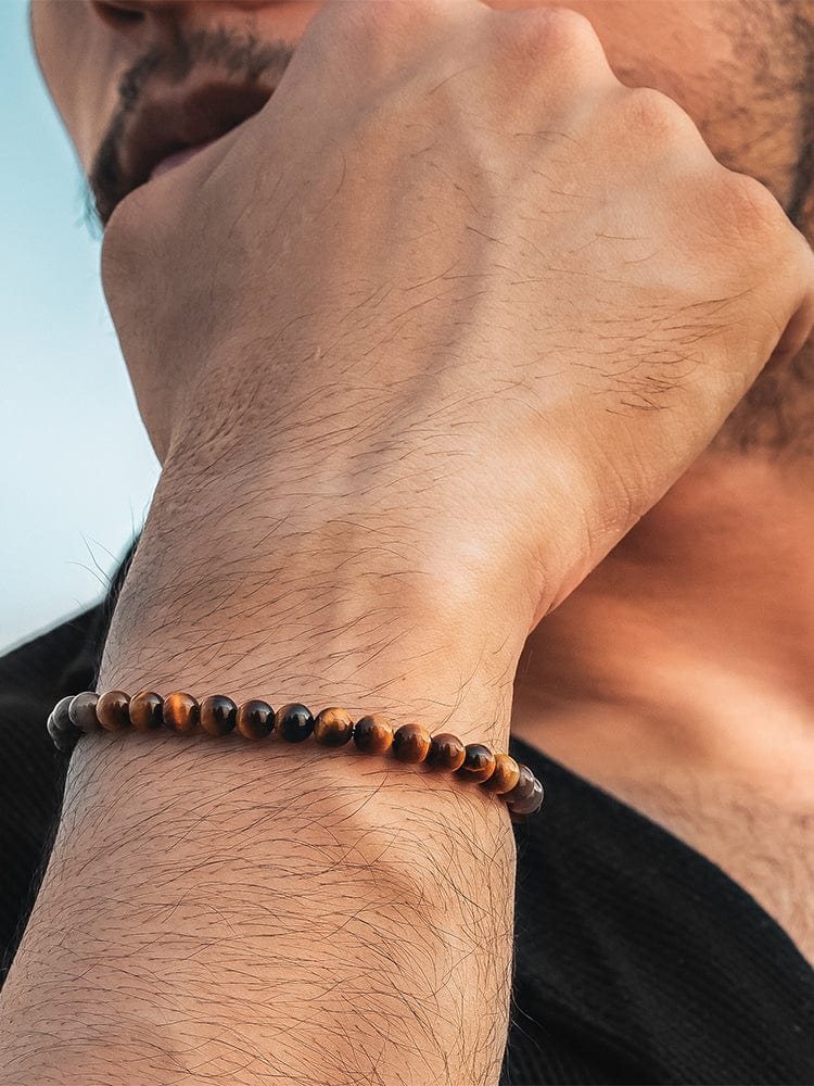 Tigers eye beaded bracelet chain detail close-up