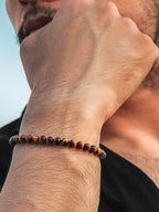 Tigers eye beaded bracelet chain detail close-up
