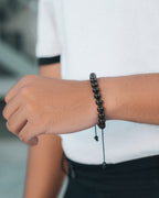 Black tourmaline beaded bracelet detail close-up
