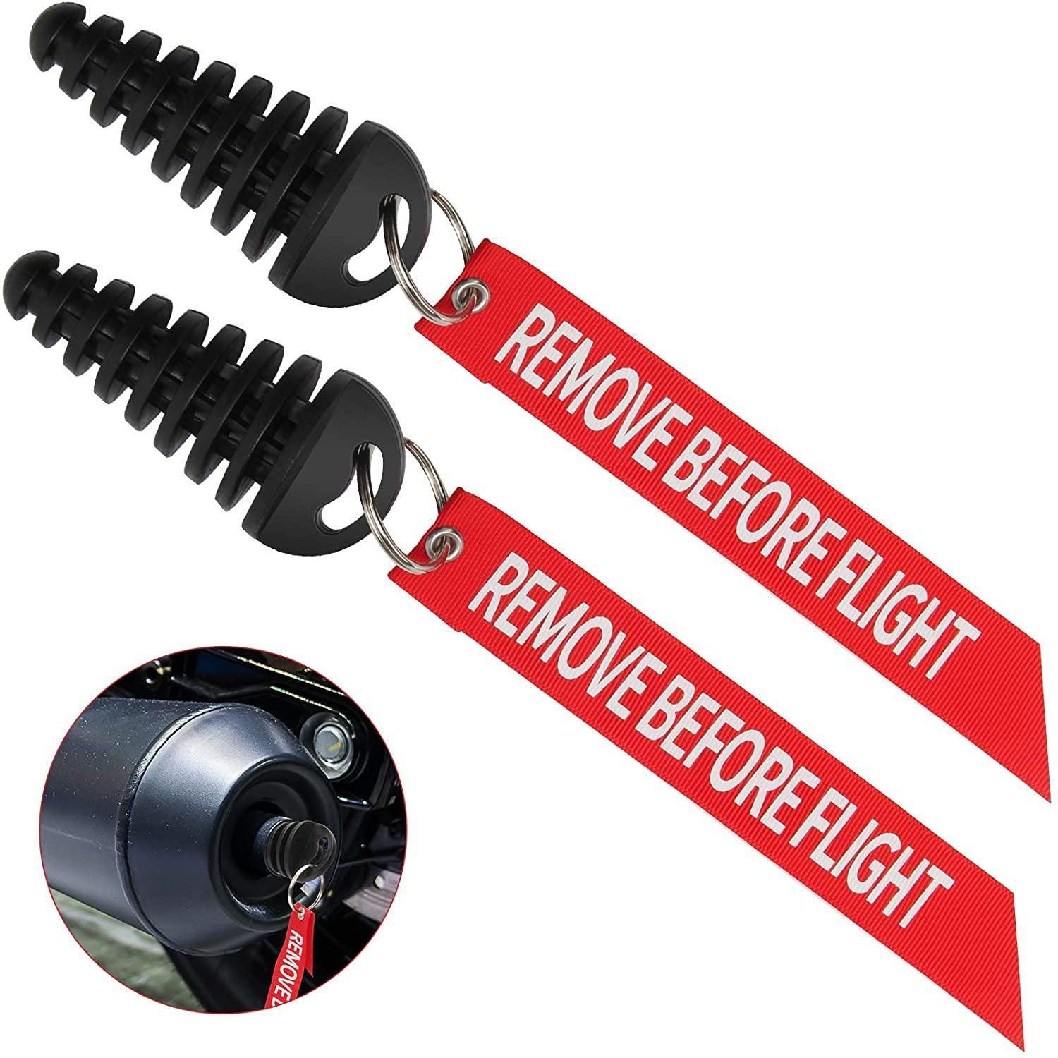 Motorcycle exhaust plug with reminder streamer for washing and storage