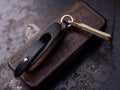 Vintage motorcycle leather clip close-up detail